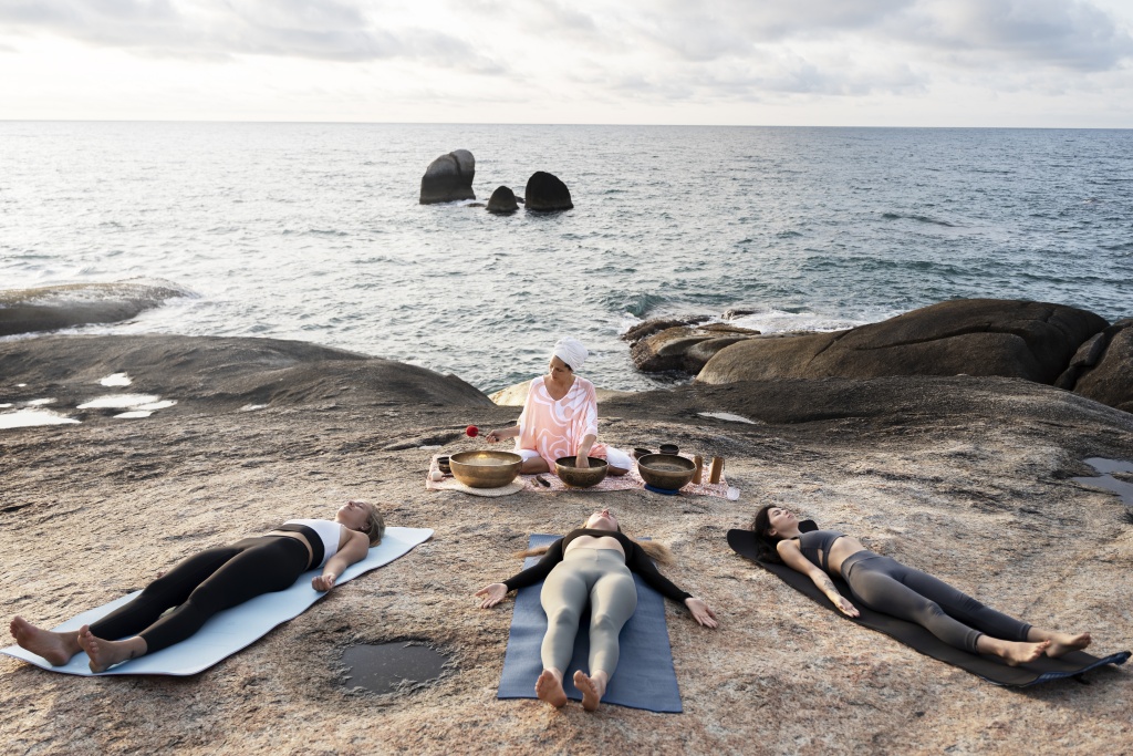 meditation-guide-with-singing-bowls-full-shot.jpg